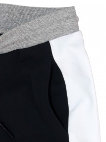 Штаны темно-синие спортивные с белыми полосами и брендингом фото