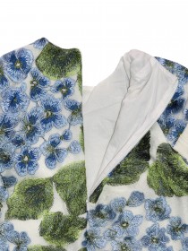 Платье бежевое с вышивкой, голубыми цветами и отделкой рюшами  фото