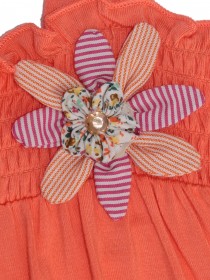 Сарафан оранжевый на лямках с цветком фото